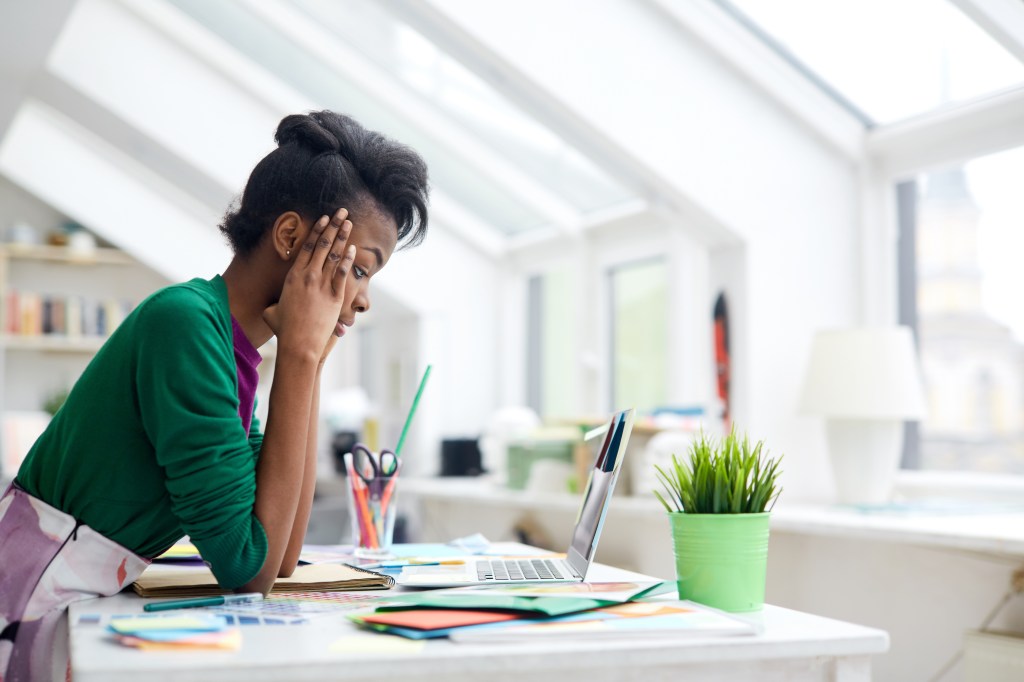 woman looking at computer screen