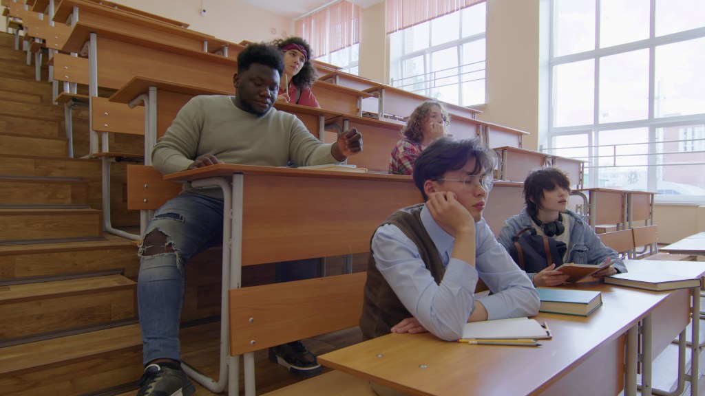 College students in classroom, Education
