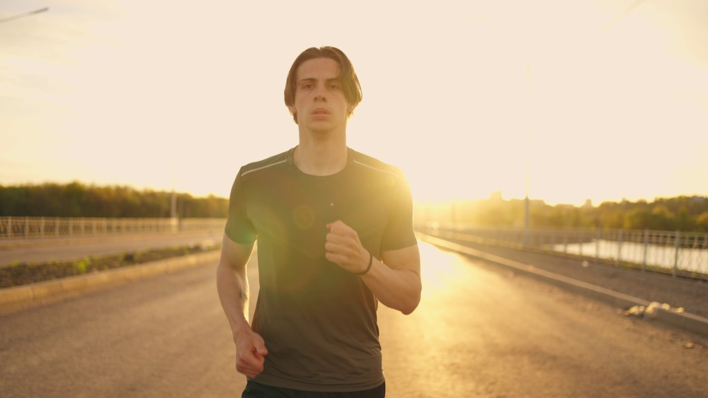 running
jogging
jogger
running down the street
